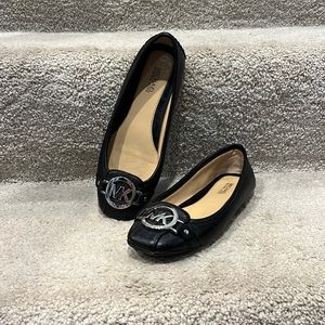 Black Michael Kors shoes.